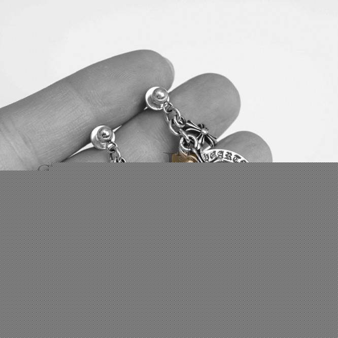 CHROME HEARTS CROSS ANGEL MEDALLION EARRING