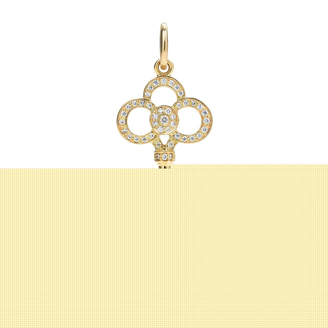 T*f*ny keys crown key in yellow gold with diamonds, 1.5